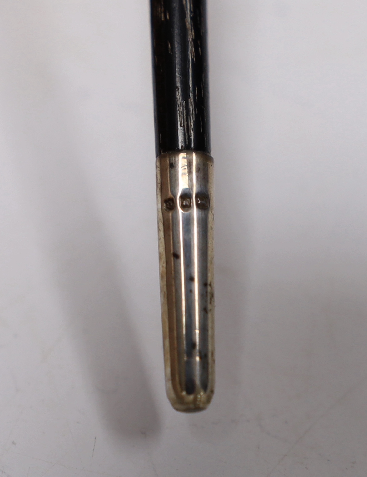 A cased George V silver mounted conductor's baton, two part baton with threaded joint, engraved dedication reading; ‘Presented to Mr. Frankland from Strand Church Choir March 1920’, hallmarked London 1919, case 24.5cm